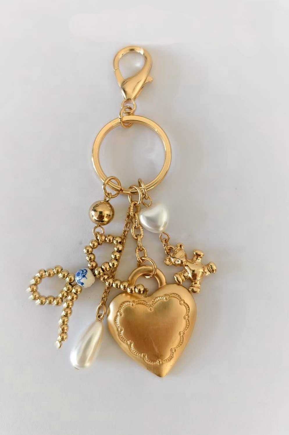 PORCELAIN BOW HEART TEDDY PEARL BAG CHARM
