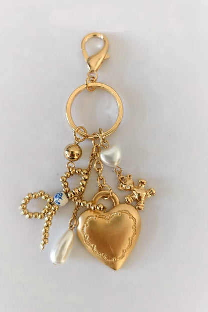 PORCELAIN BOW HEART TEDDY PEARL BAG CHARM
