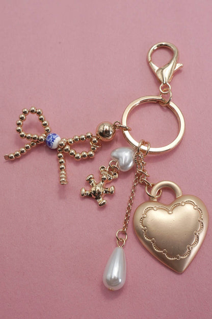 PORCELAIN BOW HEART TEDDY PEARL BAG CHARM