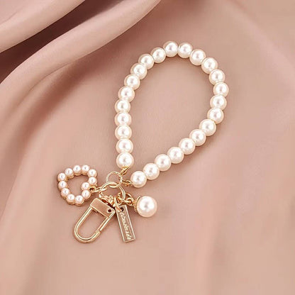 PEARL BOW HEART SEASHELL BAG KEYCHAINS