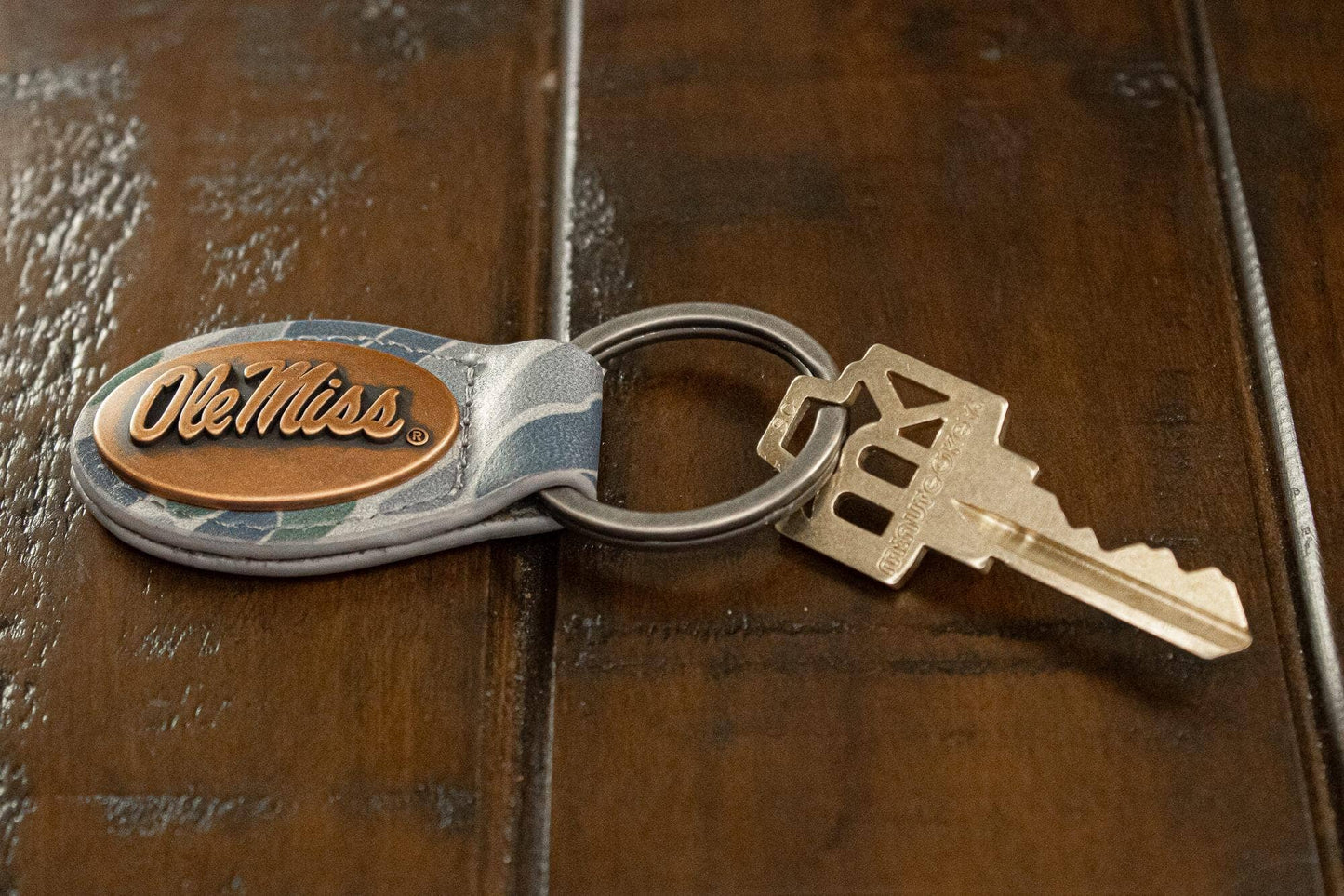 Ole Miss Rebels Oval Camo Leather Key Fob.