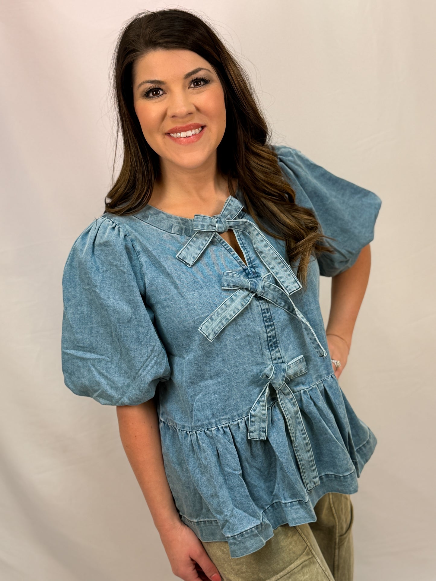 BOW FRONT DENIM PEPLUM TOP