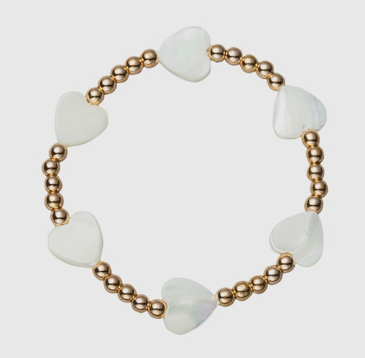 Gold beaded stretch bracelet with shell hearts