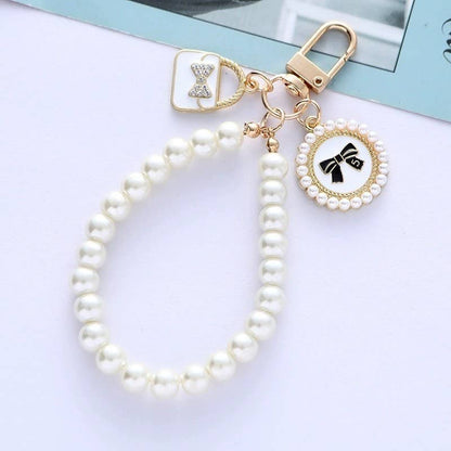 PEARL BOW HEART SEASHELL BAG KEYCHAINS