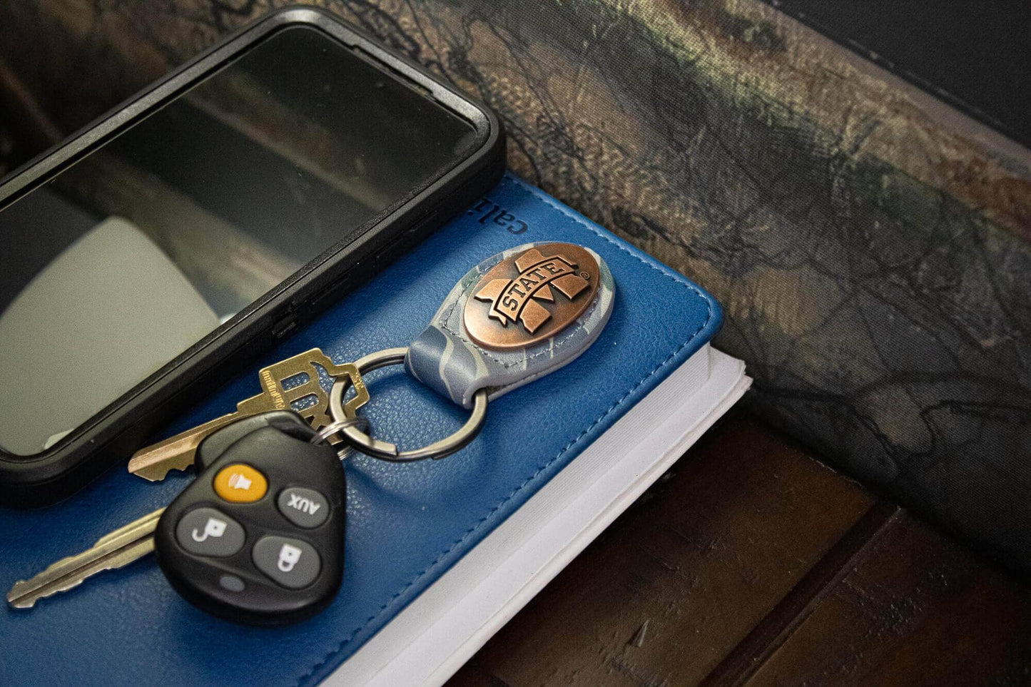 Mississippi State Bulldogs Oval Camo Leather Key Fob.